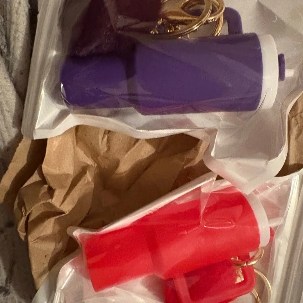 Purple and Red Keychain Pepper Sprays‎
